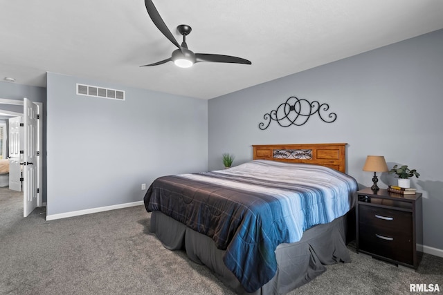 carpeted bedroom featuring visible vents, a ceiling fan, and baseboards