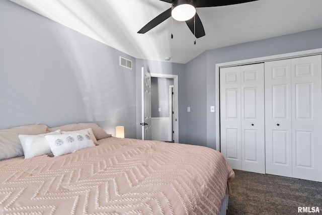 bedroom with carpet, visible vents, a closet, and ceiling fan