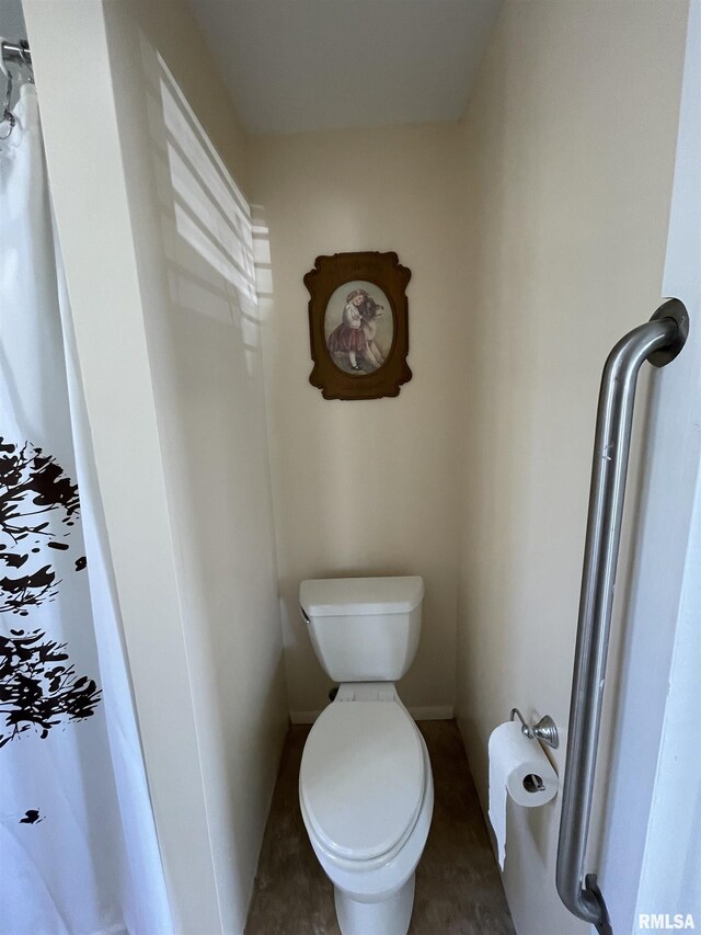 bathroom featuring toilet