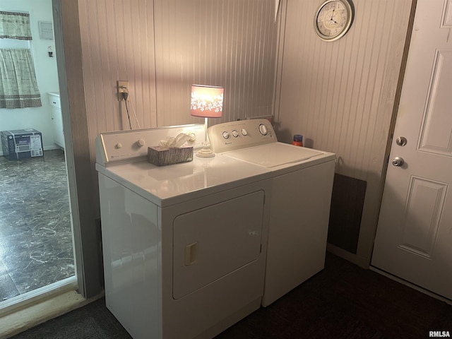 washroom featuring independent washer and dryer and laundry area