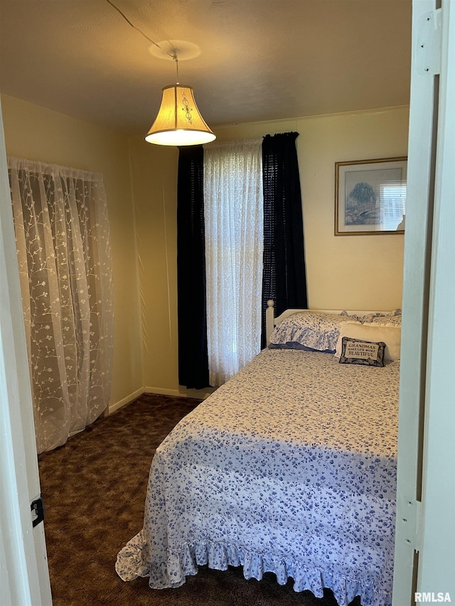 bedroom featuring carpet