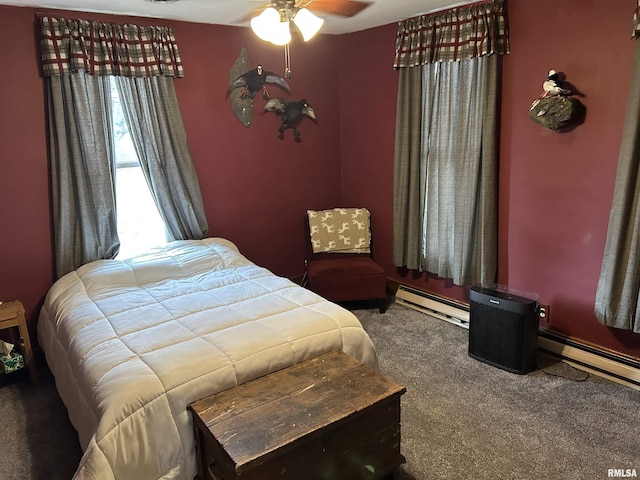 bedroom featuring baseboard heating and carpet floors