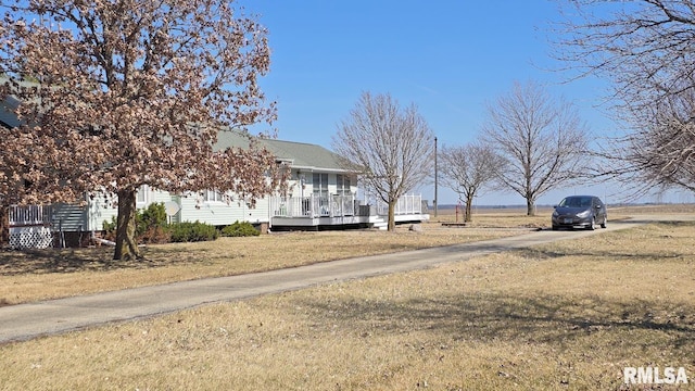 exterior space featuring a wooden deck