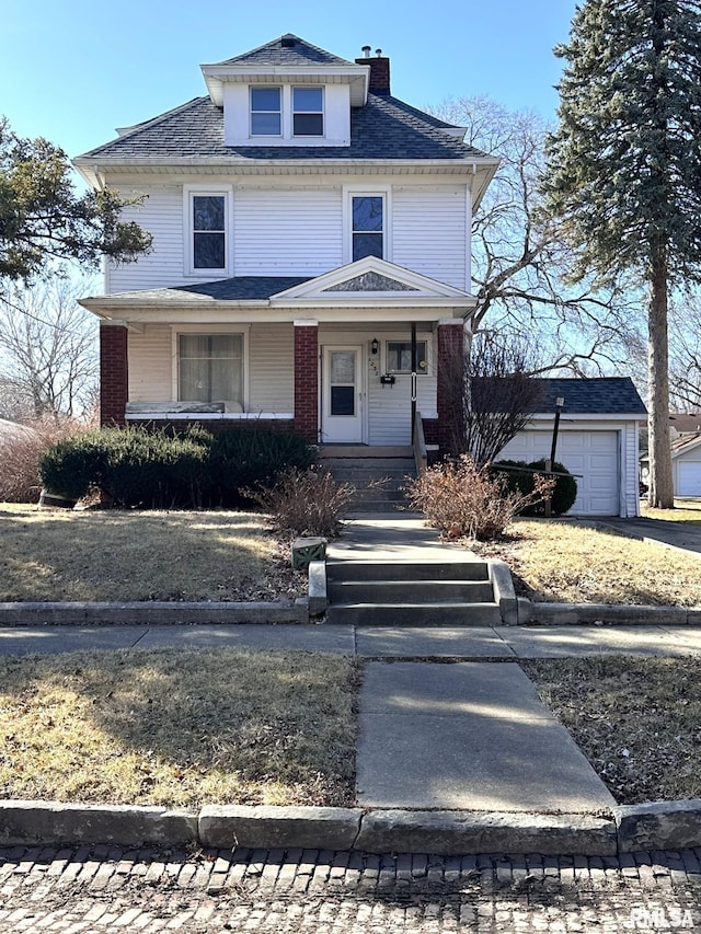 traditional style home featuring a garage, a porch, and a chimney