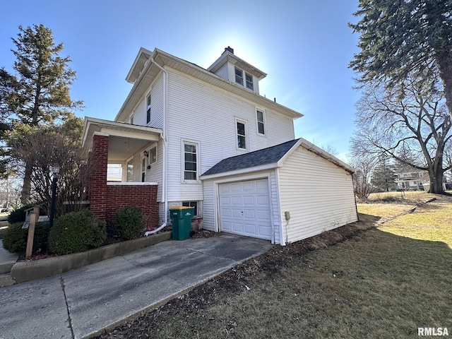 view of home's exterior featuring an attached garage, concrete driveway, and a chimney