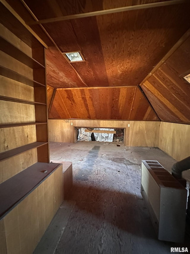 additional living space featuring vaulted ceiling