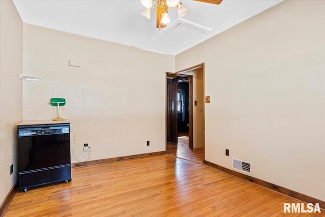 interior space with visible vents, baseboards, and light wood-style flooring