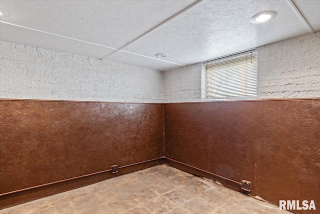 empty room with a textured ceiling