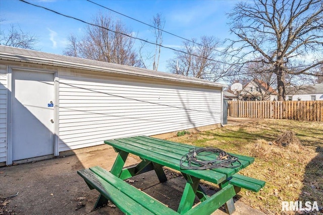 view of outbuilding with an outdoor structure and fence