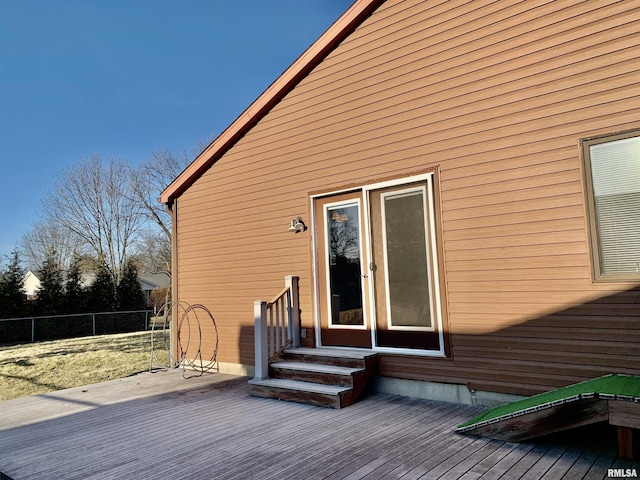 wooden terrace with entry steps and fence