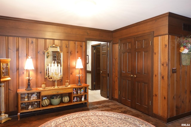 interior space with wooden walls and visible vents