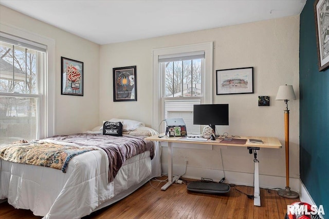 bedroom featuring hardwood / wood-style floors