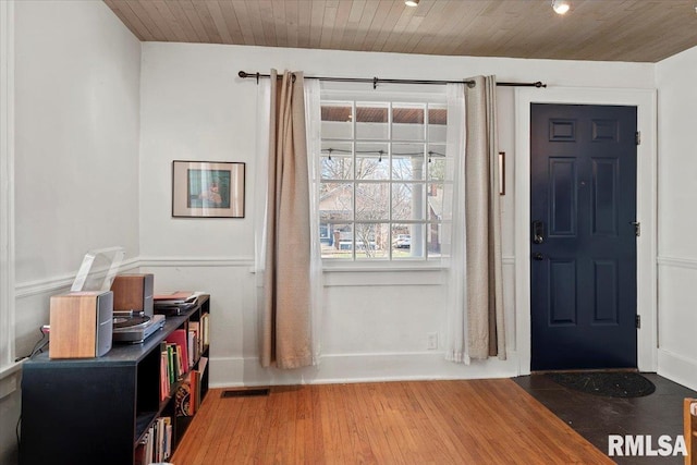 entryway featuring wood ceiling and wood finished floors