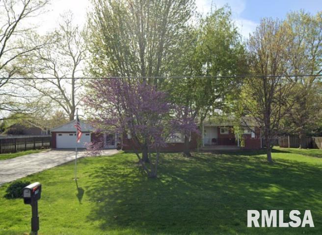 3657 N Oak Hill Rd, Rochester, IL 62563 - view of front facade with a front lawn, fence, a garage, and concrete driveway