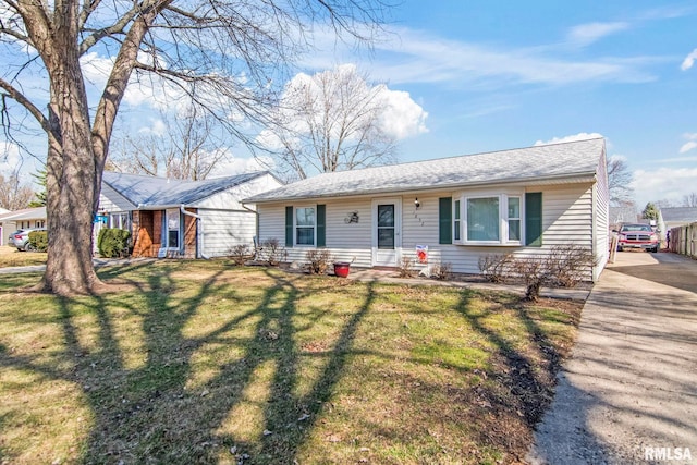 ranch-style house with a front lawn