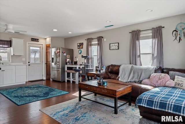 living room with dark wood-style floors, recessed lighting, and a ceiling fan