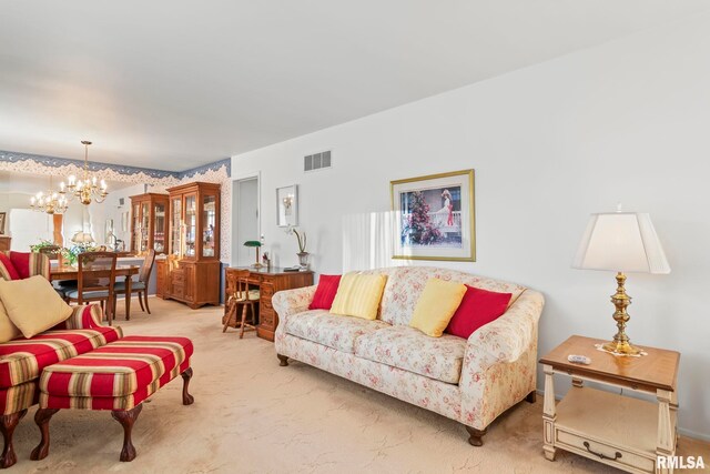 carpeted living room with visible vents and an inviting chandelier