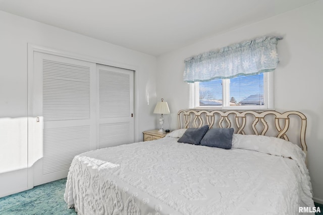 bedroom featuring a closet and carpet floors