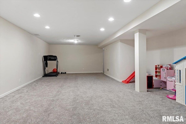 interior space featuring carpet flooring, recessed lighting, baseboards, and visible vents