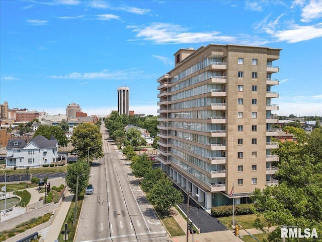 view of building exterior featuring a city view