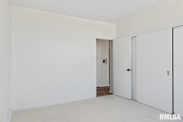 unfurnished bedroom featuring a closet