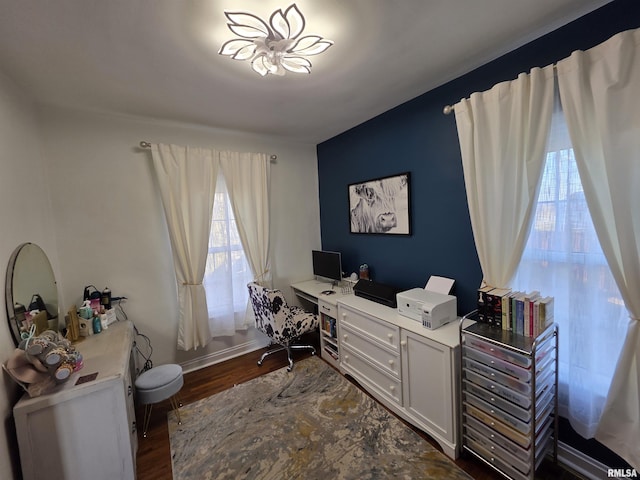 office space with baseboards and dark wood-type flooring