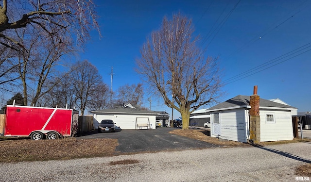 exterior space with aphalt driveway