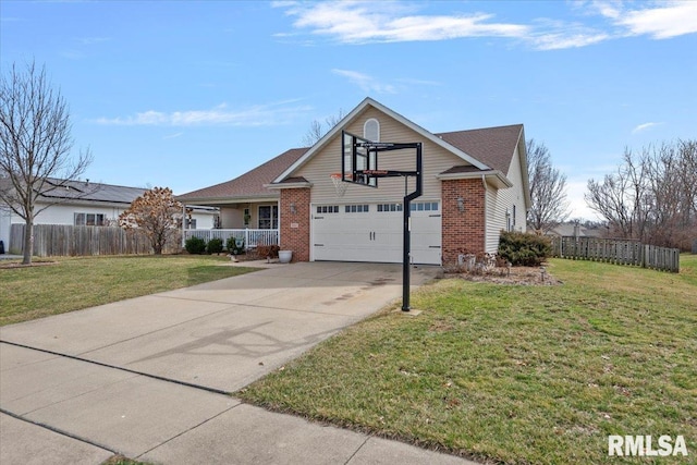 traditional home featuring brick siding, a front yard, fence, and a garage