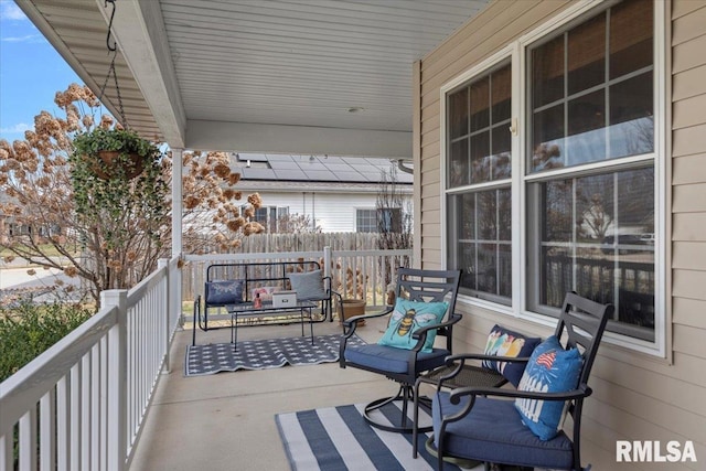 balcony featuring a porch