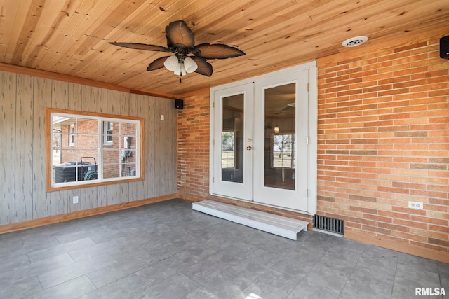 exterior space with french doors, visible vents, central AC, and a ceiling fan