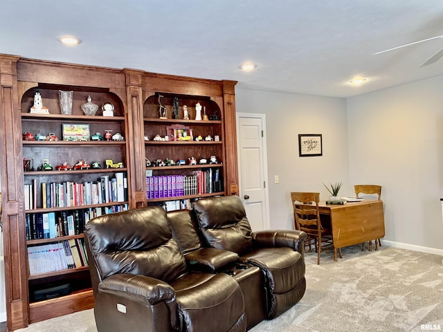 living area with recessed lighting, baseboards, and carpet floors