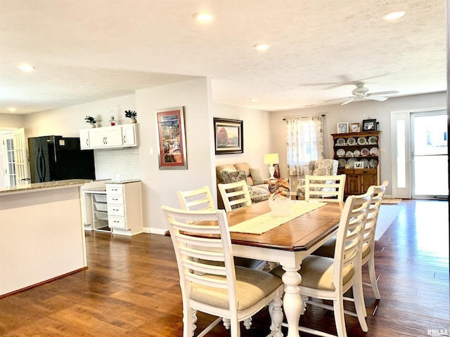 dining room featuring dark wood-type flooring, recessed lighting, baseboards, and ceiling fan