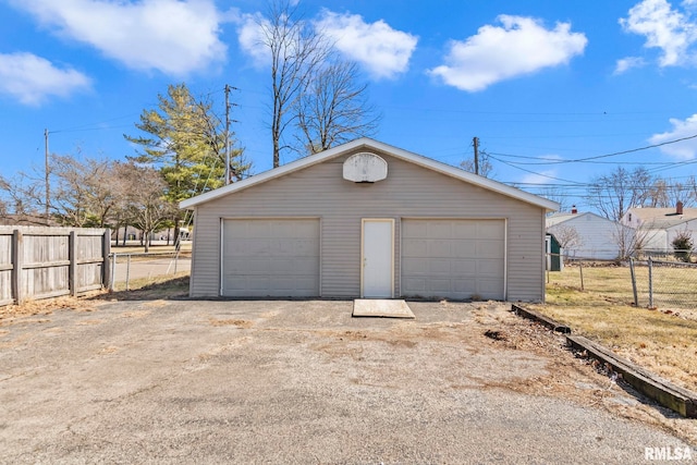 detached garage with fence