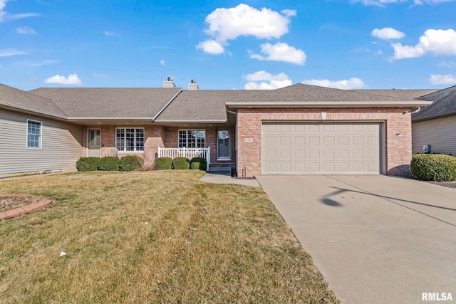 ranch-style house with a front lawn, roof with shingles, concrete driveway, an attached garage, and brick siding