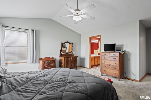 bedroom with light carpet, a ceiling fan, connected bathroom, baseboards, and vaulted ceiling