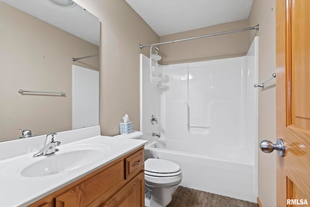 bathroom with shower / bathtub combination, toilet, and vanity