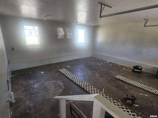 garage featuring baseboards