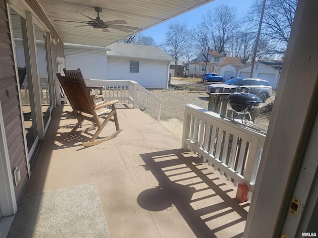 view of patio / terrace featuring a residential view, a porch, and ceiling fan