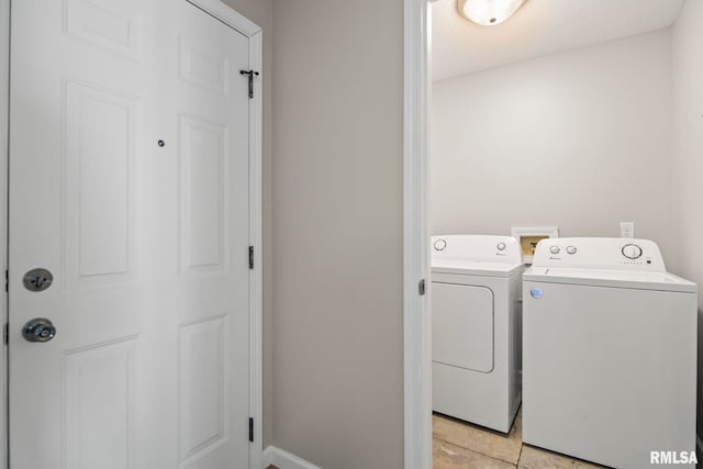 laundry room with laundry area and washing machine and dryer