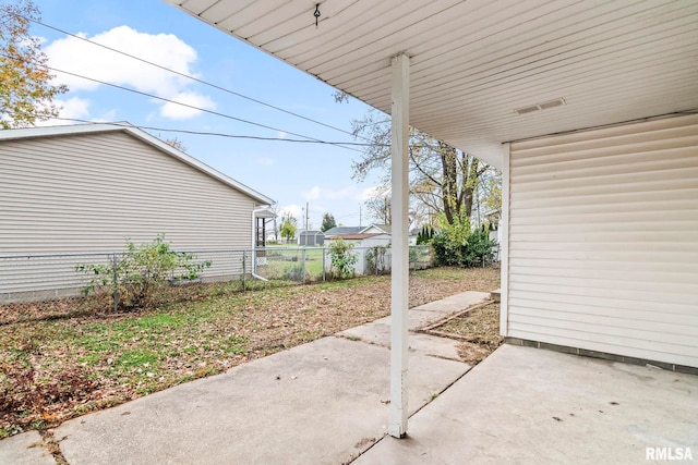 view of patio with fence