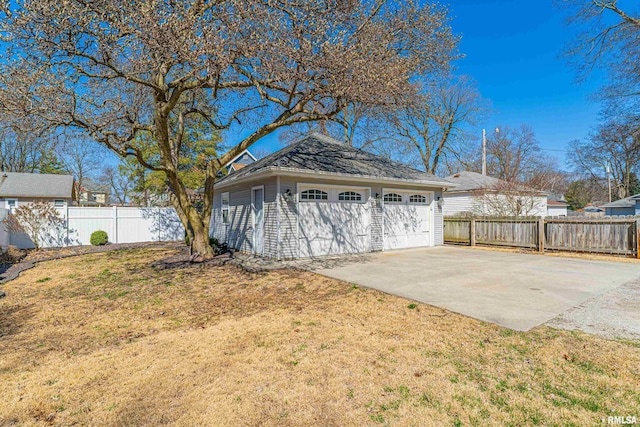 detached garage with fence