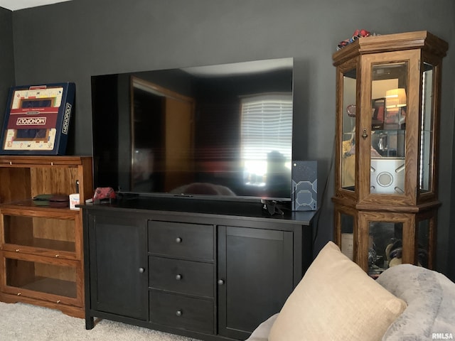 kitchen featuring gray cabinets and carpet flooring