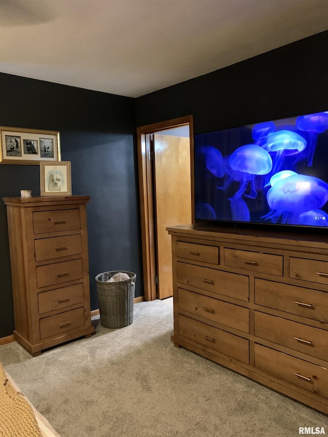 bedroom with light colored carpet