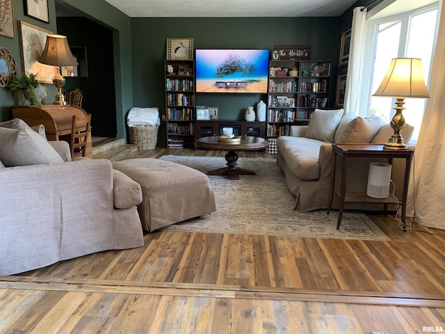 living room with wood finished floors