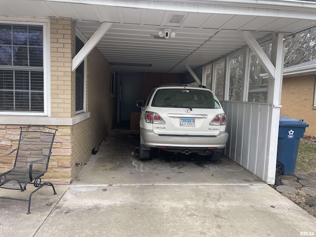 view of parking / parking lot with a carport