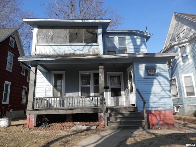 view of front of property featuring covered porch