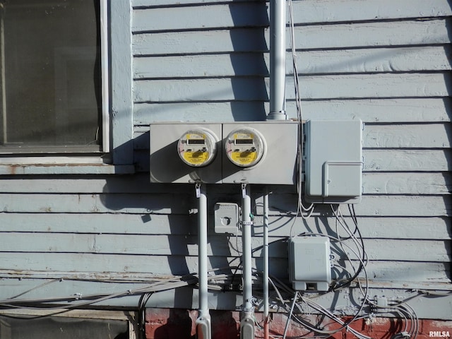 exterior details featuring electric meter