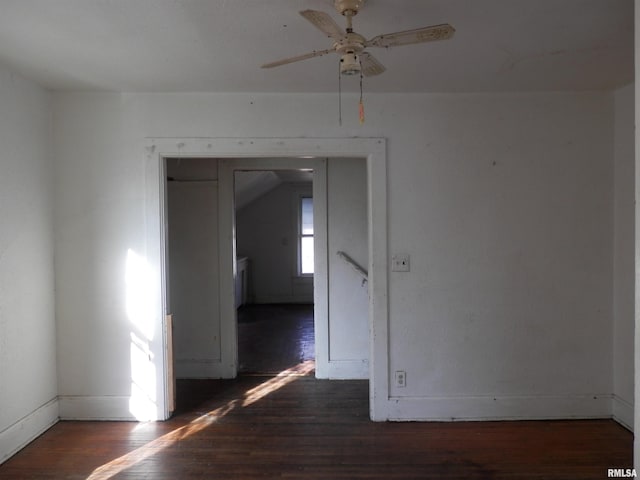 unfurnished room featuring wood finished floors and a ceiling fan