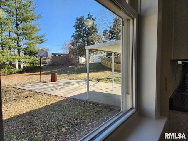 interior space featuring a patio and fence