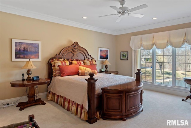 bedroom featuring recessed lighting, light colored carpet, baseboards, and ornamental molding